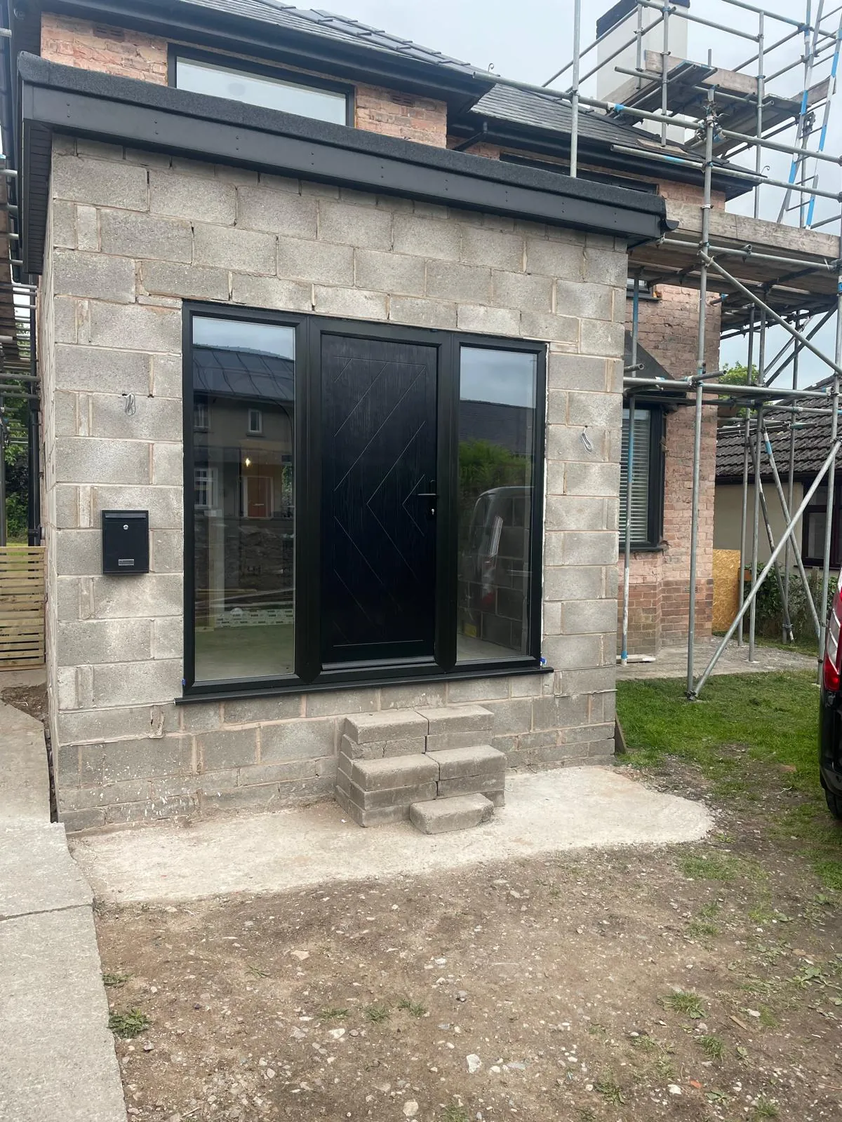The extension rendered with new glazing