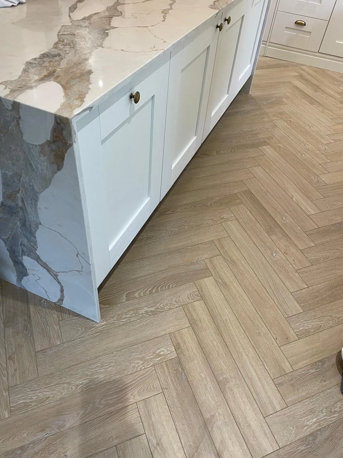 Herringbone floor and kitchen units