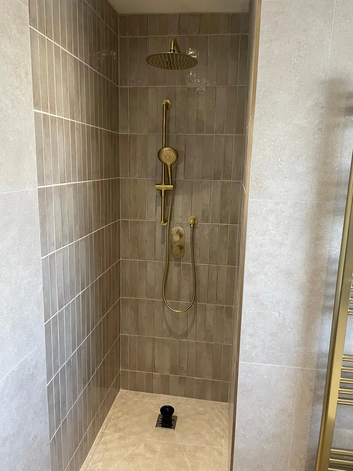 Walk in shower with brass fittings