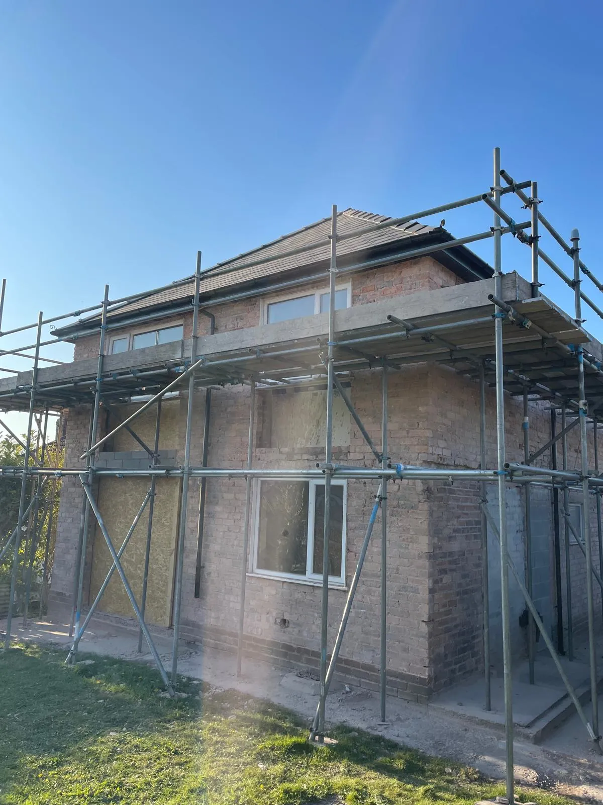 The house under scaffold