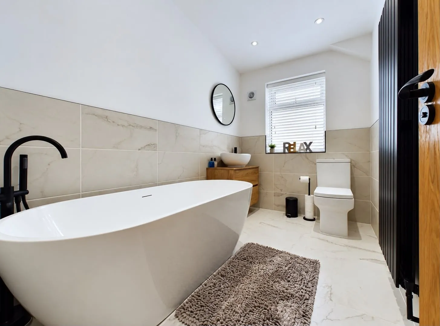 Bathroom with freestanding bath