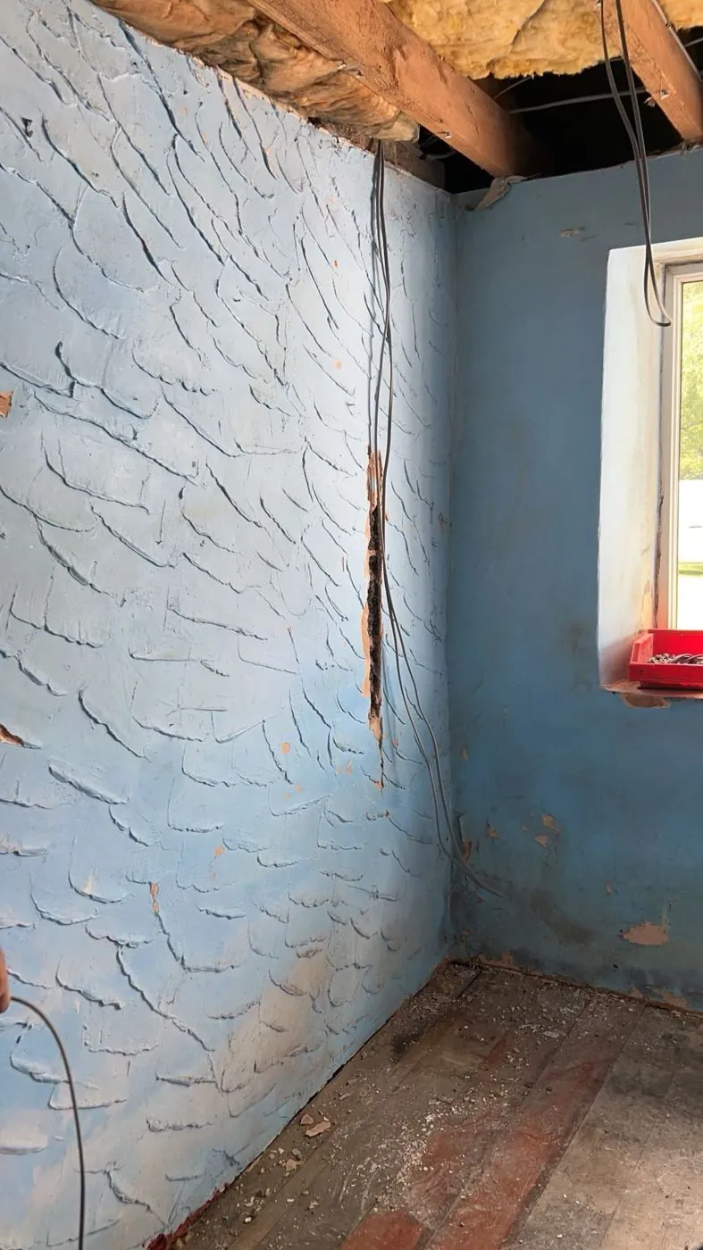 A bedroom stripped back to the walls